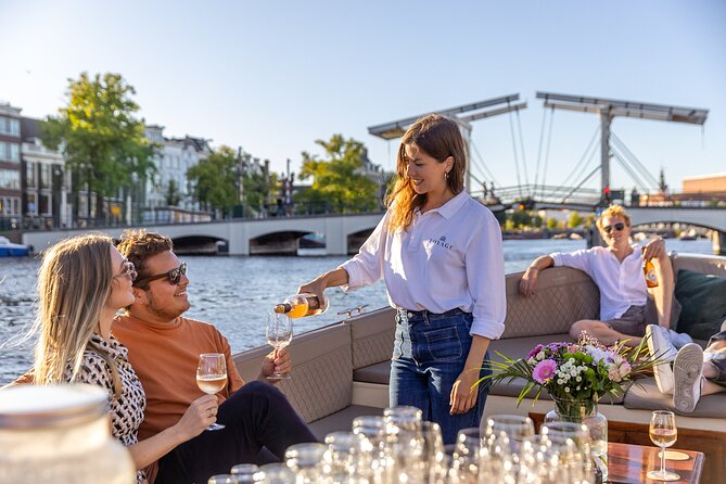 Amsterdam: 2-Hour Canal Cruise Incl. Drinks & Dutch Snacks - Inclusions and Amenities