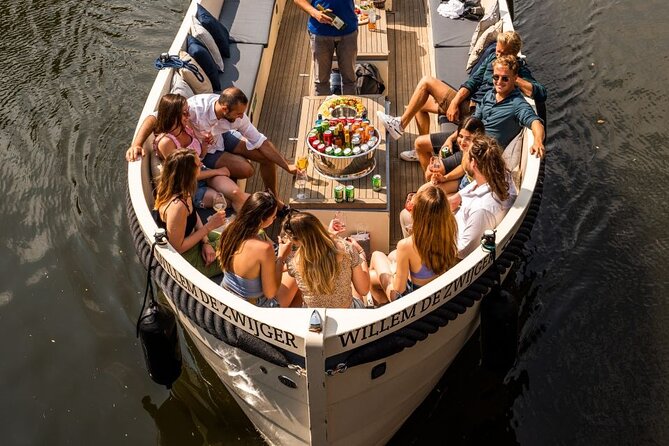 Amsterdam: Covered Booze Cruise With Unlimited Drinks Option - Overview and Experience