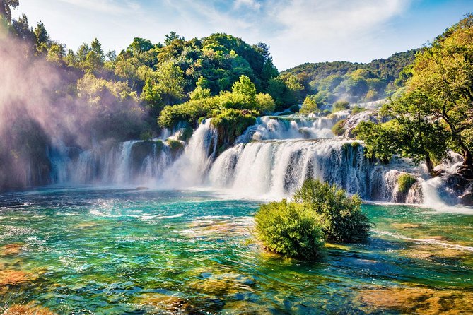 Krka National Park Tour With Tour Guide & Wine Tasting From Split & Trogir - Embarking on the Scenic Boat Ride Through the Krka River Canyon