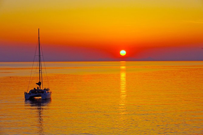 Santorini Sunset Luxury Sailing Catamaran Cruise With BBQ, Drinks, Transfer - Onboard Greek Cuisine