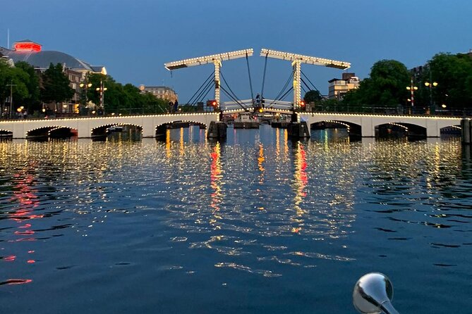 Amsterdam 1-Hour Canal Cruise With Live Guide - Meeting Point and Logistics