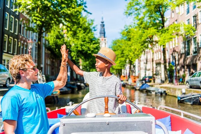 Amsterdam Canal Cruise in Open Boat With Hot Drinks - Amenities and Services Offered