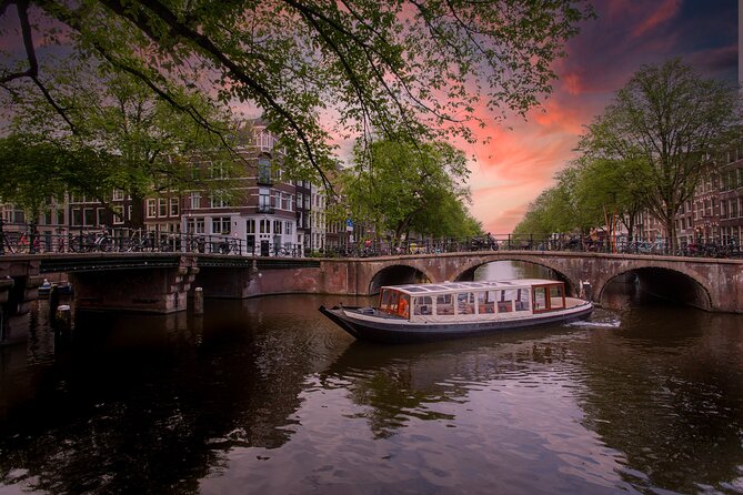 Amsterdam Evening Canal Cruise With Live Guide and Onboard Bar - Inclusions and Amenities