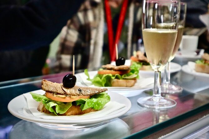 Lisbon Walking Food Tour: Tapas and Wine With Secret Food Tours - Guided Exploration