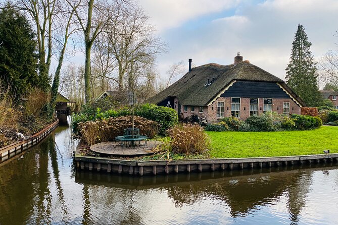 Giethoorn, Afsluitdijk, Zaanse Schans Day Tour Incl Hotel Pick Up - Tour Guide Experiences