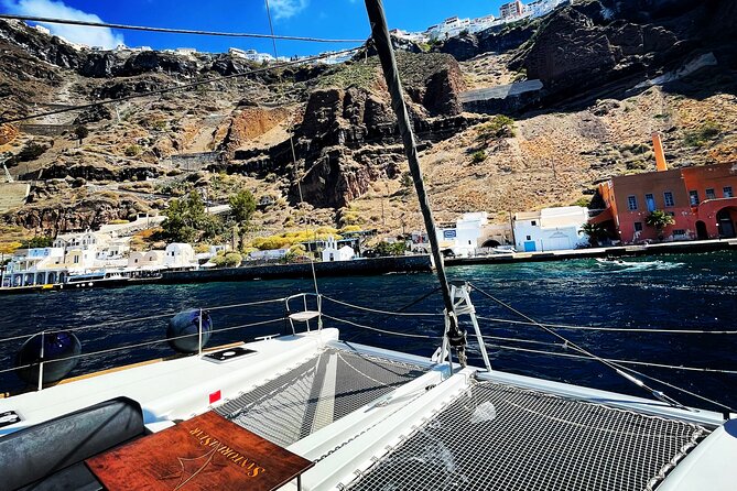 Half Day Premium Catamaran Cruise in Santorini Including Oia - Swim in the Santorini Volcanos Healing Waters