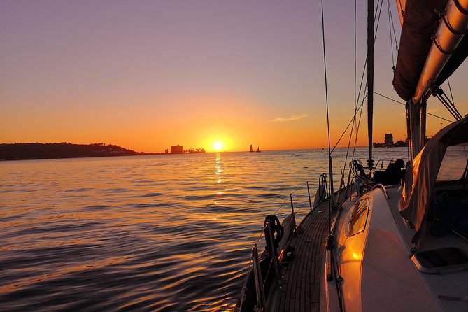 Lisbon Sunset Sailing Tour on Luxury Sailing Yacht With 2 Drinks - Refreshments and Amenities