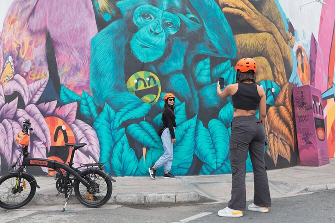 Medellín: the Essential E-Bike City Tour With Typical Drink - Knowledgeable and Passionate Guides