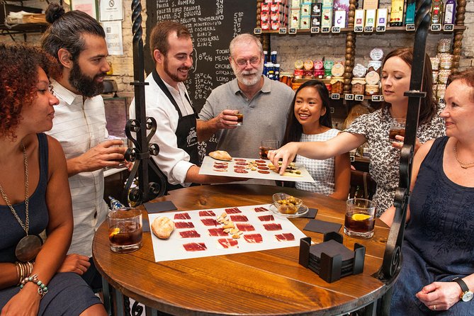 Devour Seville: Tapas & Wine Small Group Tour With Flamenco Show - Exploring Andalusian Food and Tapas Culture