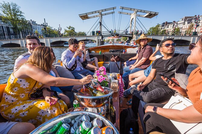 Amsterdam 1-Hour Canal Cruise With Live Guide - Live Guided Commentary and Insights