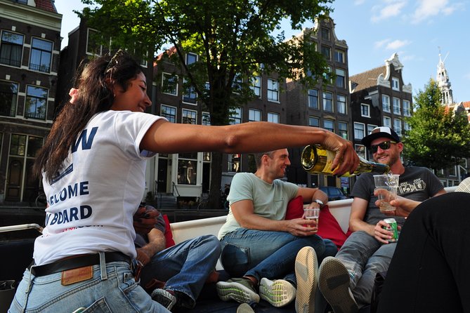 Amsterdam Canal Cruise With Live Guide and Unlimited Drinks - Cruise Details and Itinerary