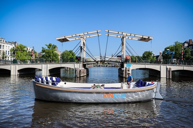 Amsterdam Canal Cruise in Open Boat With Hot Drinks - Meeting Points and Logistics