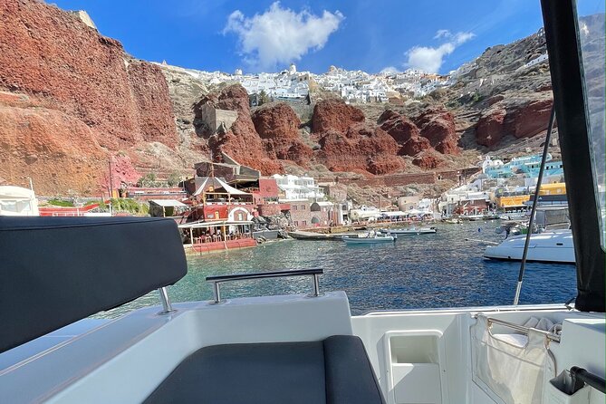 Half Day Premium Catamaran Cruise in Santorini Including Oia - Witness the Stunning Sunset From the Catamaran