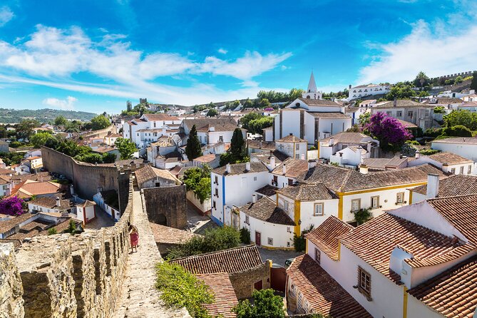 Three Cities in One Day: Porto, Nazare and Obidos From Lisbon - Discovering the Seaside Allure of Nazare