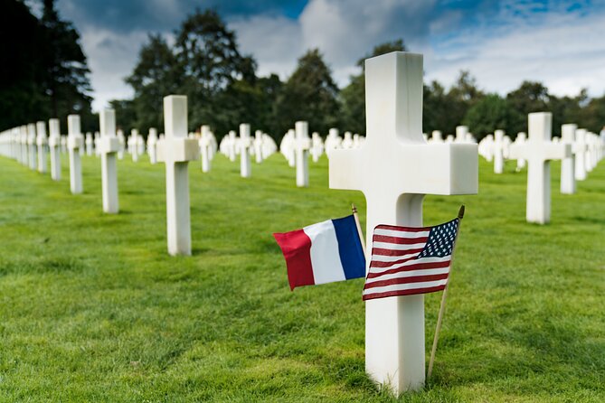 Normandy D-Day Sites & Cemetery Day Trip From Paris With Lunch - Scaling the Dramatic Cliffs of Pointe Du Hoc