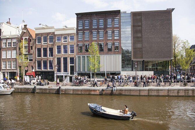 Amsterdam Canal Cruise in Open Boat With Hot Drinks - Key Points