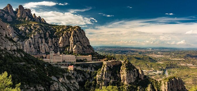 Montserrat Lunch & Wine at Farmhouse Small Group From Barcelona - Key Points