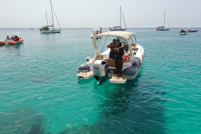 Guided Boat Excursion Sella Del Diavolo. Possible Sighting of Dolphins - Meeting Point and Emergency Contact